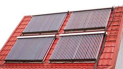 Solar Glass Tube Hot Water Panel Array Mounted On A Tiled Roof Water