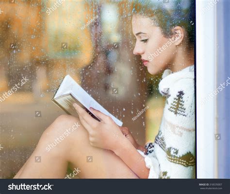 Beautiful Young Brunette Woman Reading Book Wearing