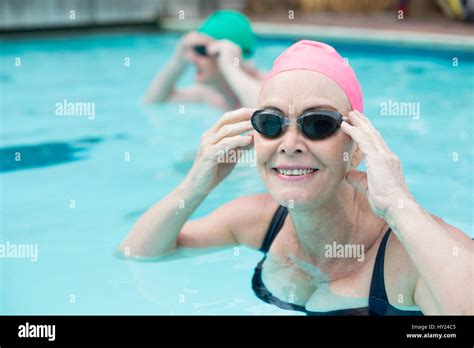 Close Up Portrait Of Mature Woman Swimming In Pool Stock Photo Alamy