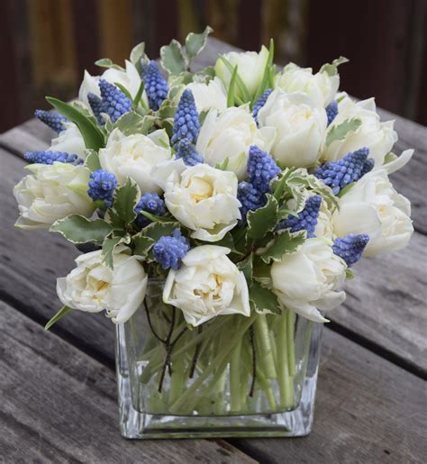 Elegant Flower Arrangement With White Tulips And Blue Muscari