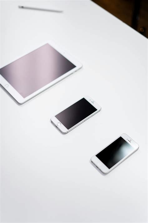 White Samsung Galaxy Smartphone Beside White Smartphone · Free Stock Photo