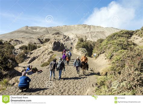 Tourists Travel On The Path To Mount Bromo Crater