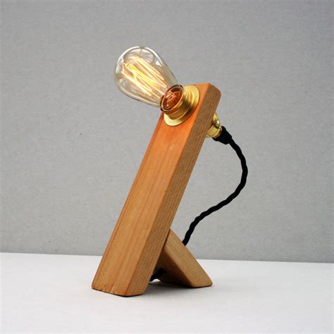 Minimalist table lamps are also great for work/living spaces where they can provide practical lighting and interesting decor simultaneously. minimalist edison table lamp by unique's co. | notonthehighstreet.com