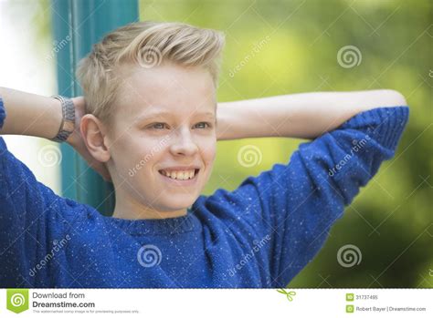 Happy Relaxed Smiling Teenager Boy Outdoor Stock Image - Image of sunny, relaxed: 31737495