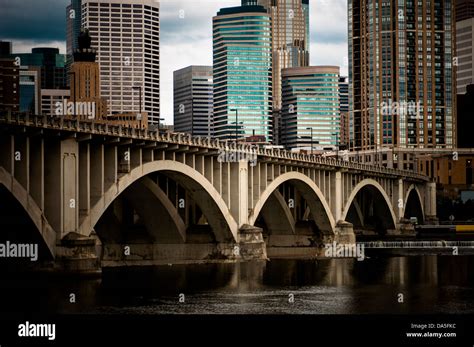 Minneapolis Skyline And Third Avenue Bridge Over The Mississippi River