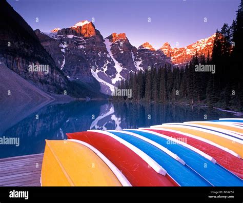 Canoes On Dock At Moraine Lake Banff National Park Alberta Canada