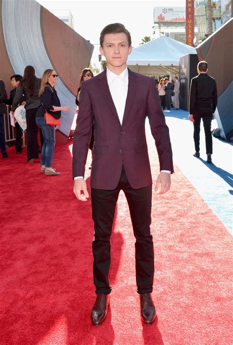 Tom holland, who stars as peter parker, looked dapper in a simple suit, while robert downey jr. Tom Holland Photos Photos - The World Premiere of Marvel's 'Captain America: Civil War' - Red ...
