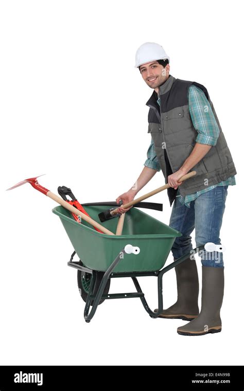 Construction Worker Pushing Wheelbarrow Hi Res Stock Photography And