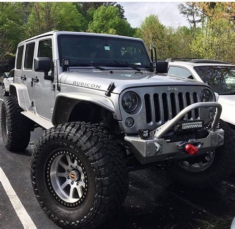 Silver Jeep With A Great Lift Wheels And Tires Jeep Wrangler Silver
