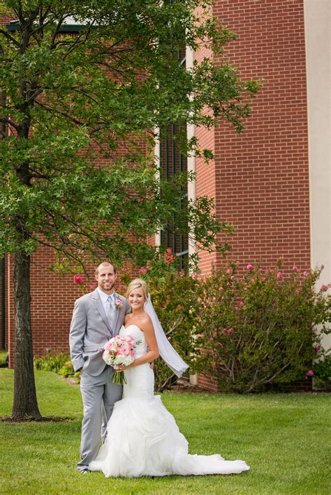 Extravagantly white shirt embellished with a black tux and removable black belt. Gray Groom's tux and Primrose wedding dress by Maggie ...