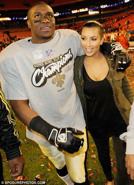 Super Bowl 2010 Kim Kardashian Kisses Reggie Bush After New Orleans