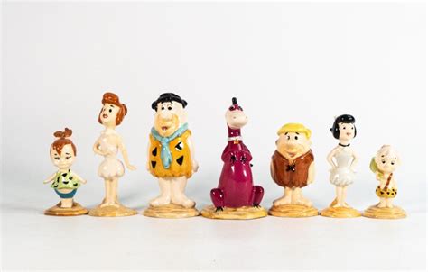 At Auction Beswick Flintstones Figures Fred And Wilma Pebbles