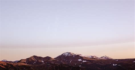 Mountain Landscape Against Sunset Sky · Free Stock Photo