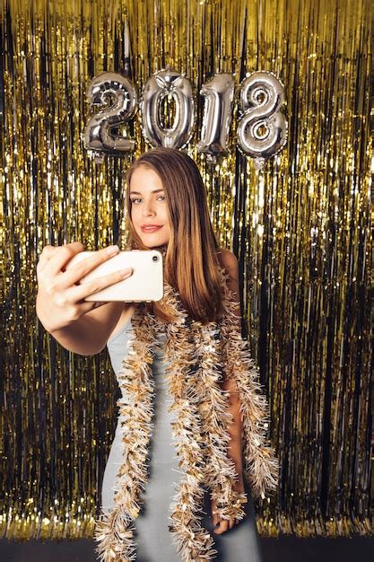 Free Photo Blonde Girl Taking Selfie On New Year Celebration