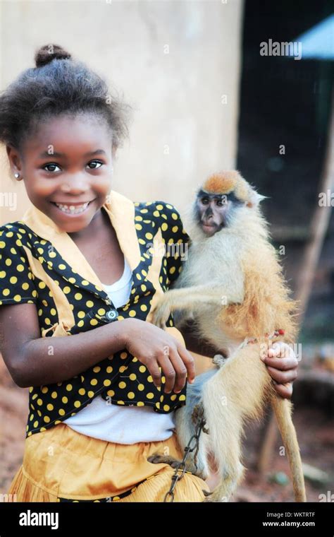 Close Up Girl Holding Monkey Hi Res Stock Photography And Images Alamy