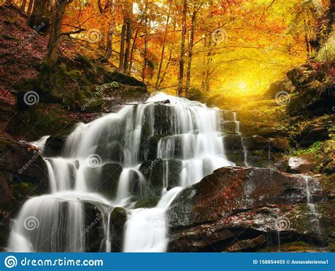 Waterfall Cascade In A Beautiful Deciduous Autumn Forest Bright Autumn
