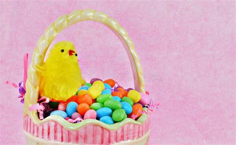 Easter Basket Filled With Jelly Beans And Topped With A Fuzzy Chick