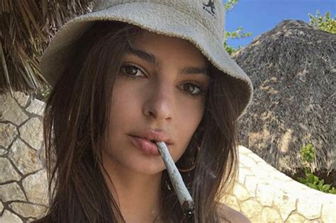 Emily Ratajkowski Strips Topless Before Posing With Suspicious Looking