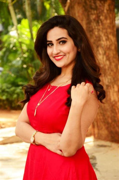 hot stills of anchor manjusha in red dress actress album