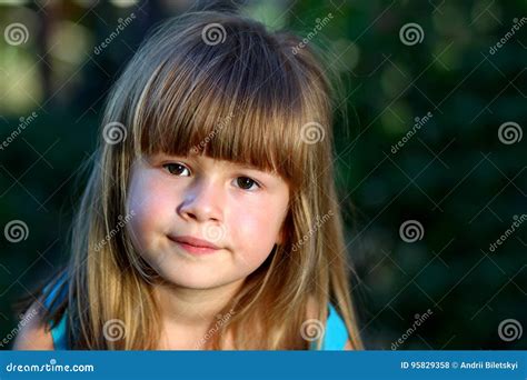 Little Girl Smile At The Camera Portrait Of Happy Positive Sm Stock