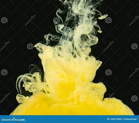 Yellow White Acrylic Cloud Dissolving Into Water Isolated On Black