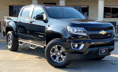 2015 chevrolet colorado z71 red hot posted august 20, 2015 had my red hot z71 for almost two months now and currenty have a rough country 2 inch level (thinking about changing out to the pro comp 2.5 inch level with strut extenders), swapped to 275/70/17 bf goodrich ko2 tires, and 1.25 inch bora wheel spacers for an enhanced broader. Pin by Zach on Chevy colorado in 2020 | Chevy colorado ...