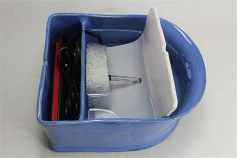 The pet water fountain is equipped with 3 replacement filters, each composed of activated carbon, ion exchange resin and. Pet-Battery-Fountain-PB18003