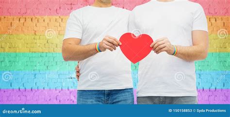 Couple With Gay Pride Rainbow Wristbands And Heart Stock Image Image Of Homosexuality Partner