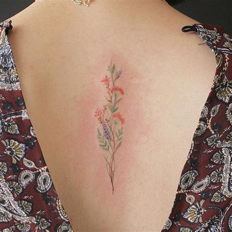 Delicate Wildflower Tattoo On The Back