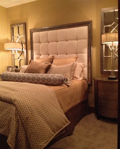 Brown everything, with slightly curved outer wall. Elegant Master Bedroom in a small space. - Traditional ...