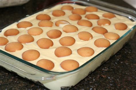 Not yo mama's banana pudding recipe calls for bananas, french vanilla instant pudding, sweetened condensed milk, whipped cream, cream cheese, and cookies. Sadie's Kitchen Adventures: Paula Deen's Banana Pudding
