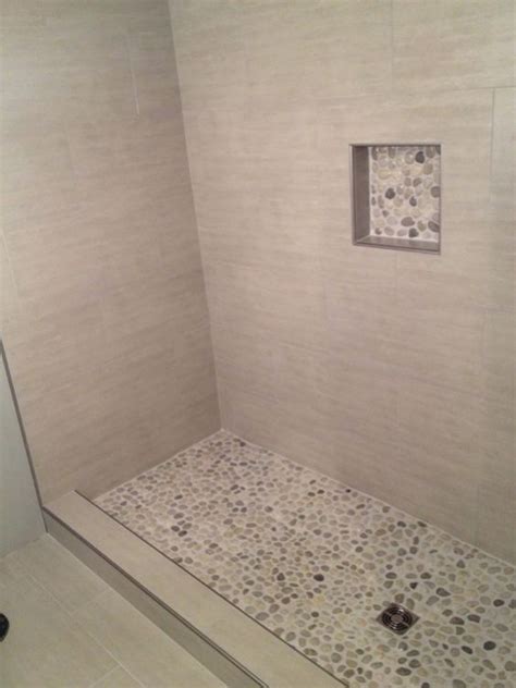 Black pebble stone shower floor. Pebble stones for a shower floor inspiration | Pisos para ...