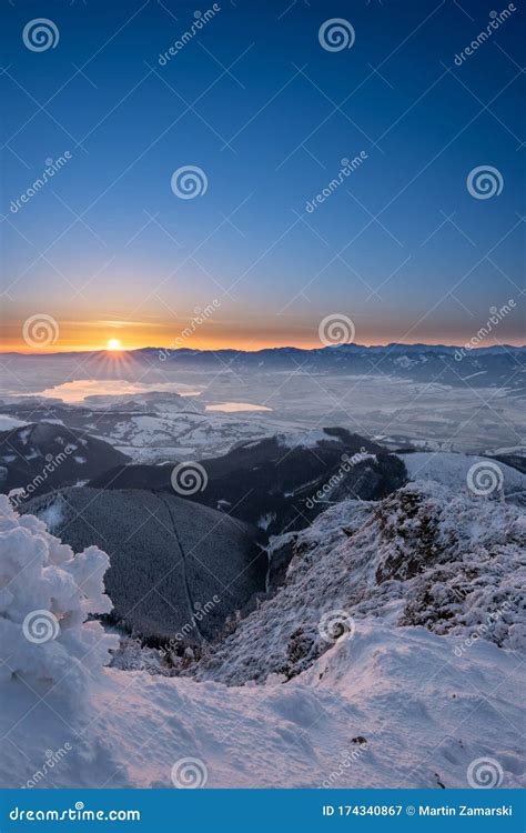 Snow Covered Landscape Sunrise From Velky Choc Mountain In Winter With