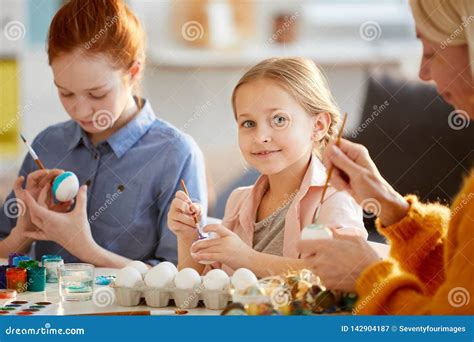 Cute Girl Painting Eggs For Easter Stock Image Image Of Craft Group