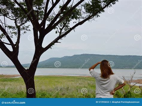 Traveler Looking Across The River To Mountain Stock Image Image Of