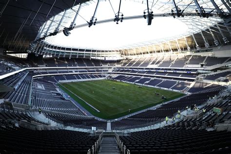 Tottenham hotspur have confirmed they will play the first game in their new stadium against crystal palace on wednesday 3 april. New Tottenham stadium: Pitch is laid as Spurs unveil ...