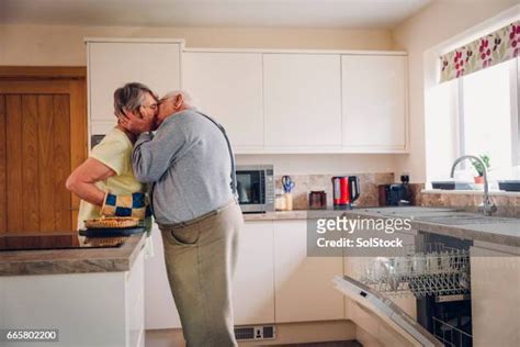 Couple Making Out In Kitchen Photos Et Images De Collection Getty Images