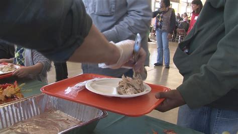 Volunteers Prepare Thanksgiving Meals For The Homeless