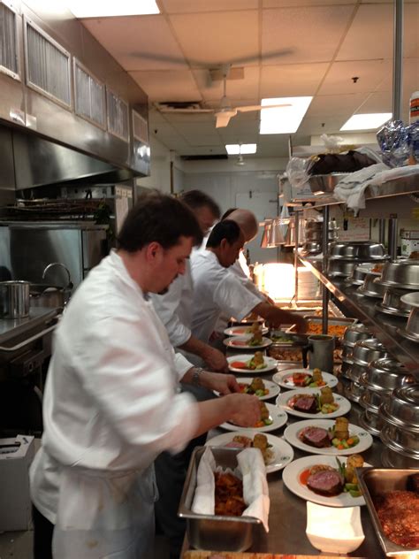 Culinary Team plating dinner entree | Dinner entrees, Delicious catering, Culinary