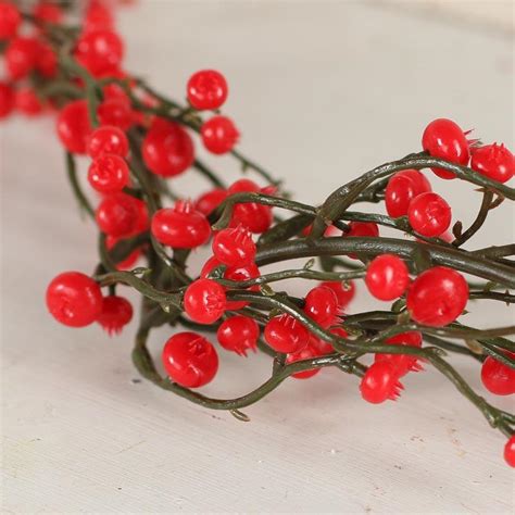 If decorative mirrors are hung around the house, a festive garland could add to their beauty, while the mirror itself reflects the festivities berries are another alternative for an outdoorsy strand of garland. Red Artificial Berry Garland - Christmas Garlands ...