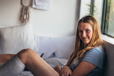 teen hanging out in her bedroom by stocksy contributor gillian vann stocksy