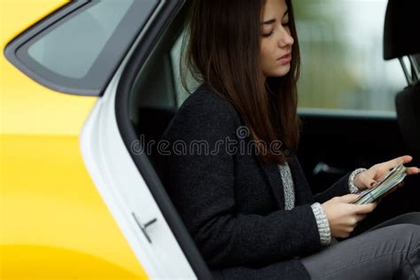 beautiful brunette sitting in taxi stock image image of detail relax 81487025