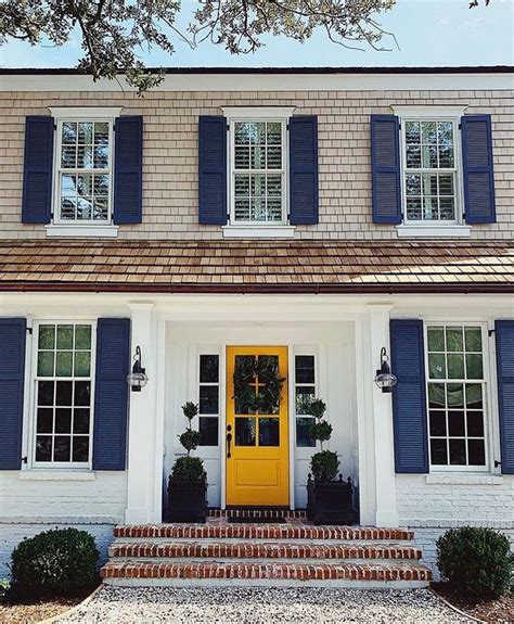 Stunning Yellow House With Navy Blue Shutters A Must See Home