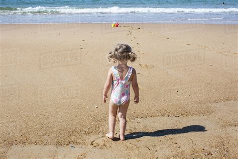 Babe Girl At The Beach Rear View Stock Photo Dissolve Min