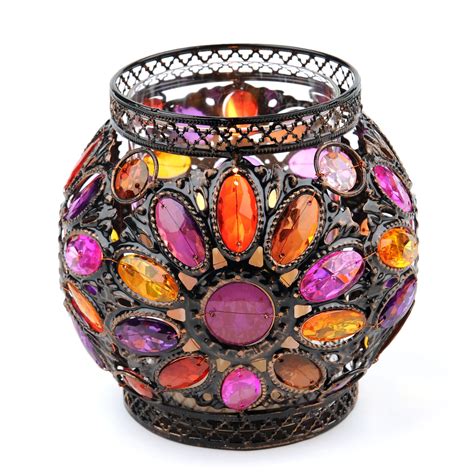 From whimsical animal candle holders to elegant filigree lanterns, there is something for every decor. Pink & Orange Jeweled Candle Holder | Jewel candles ...