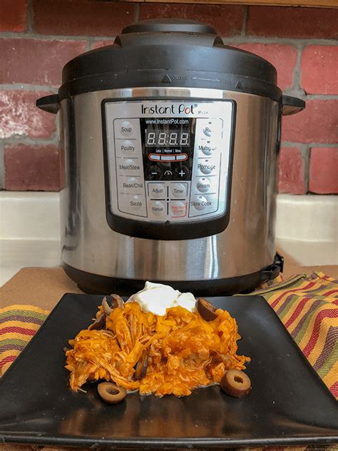 Chicken enchiladas with sour cream sauce. Instant Pot Chicken Enchiladas Casserole