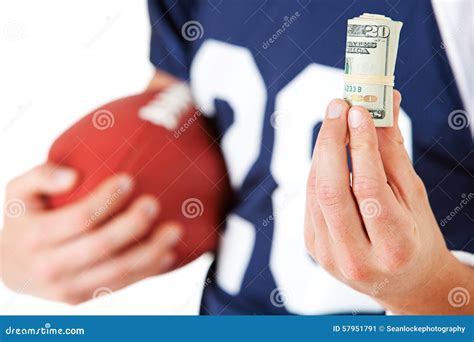 Football Holding A Roll Of Cash Stock Image Image Of Background Anonymous 57951791