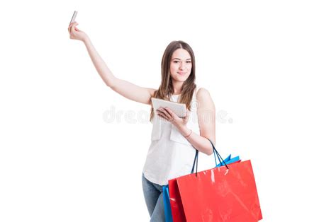 Shopper Using Smartphone Scans Qr Code On Label In Supermarket Stock