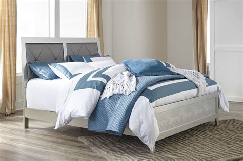 Keepsakes are more than just memories of events that happen in a person's life. Olivet Silver Queen Upholstered Panel Bed | Marjen of ...
