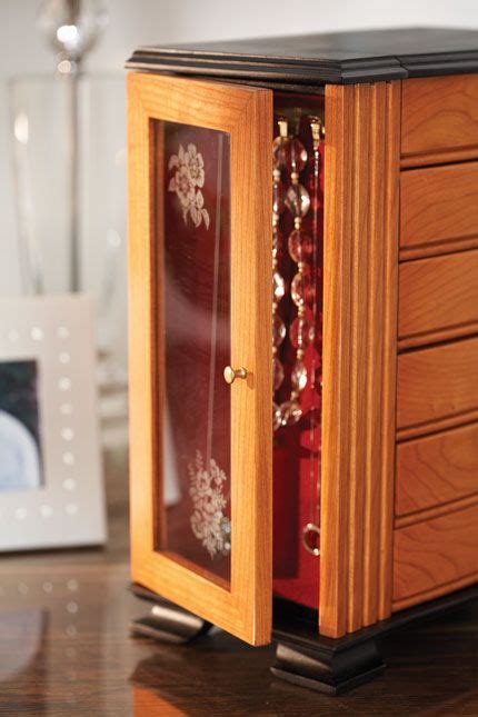 jewelry box  glass doors hinged lid   drawers